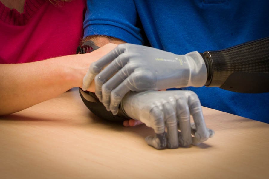 Gerry and Denise Kinney holding hands