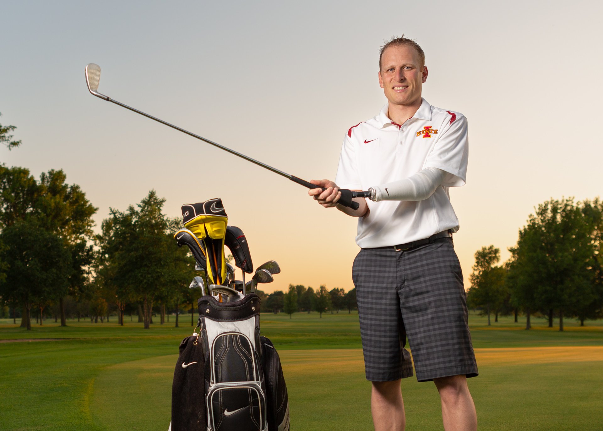 A transradial amputee with a golf activity-specific prosthesis.