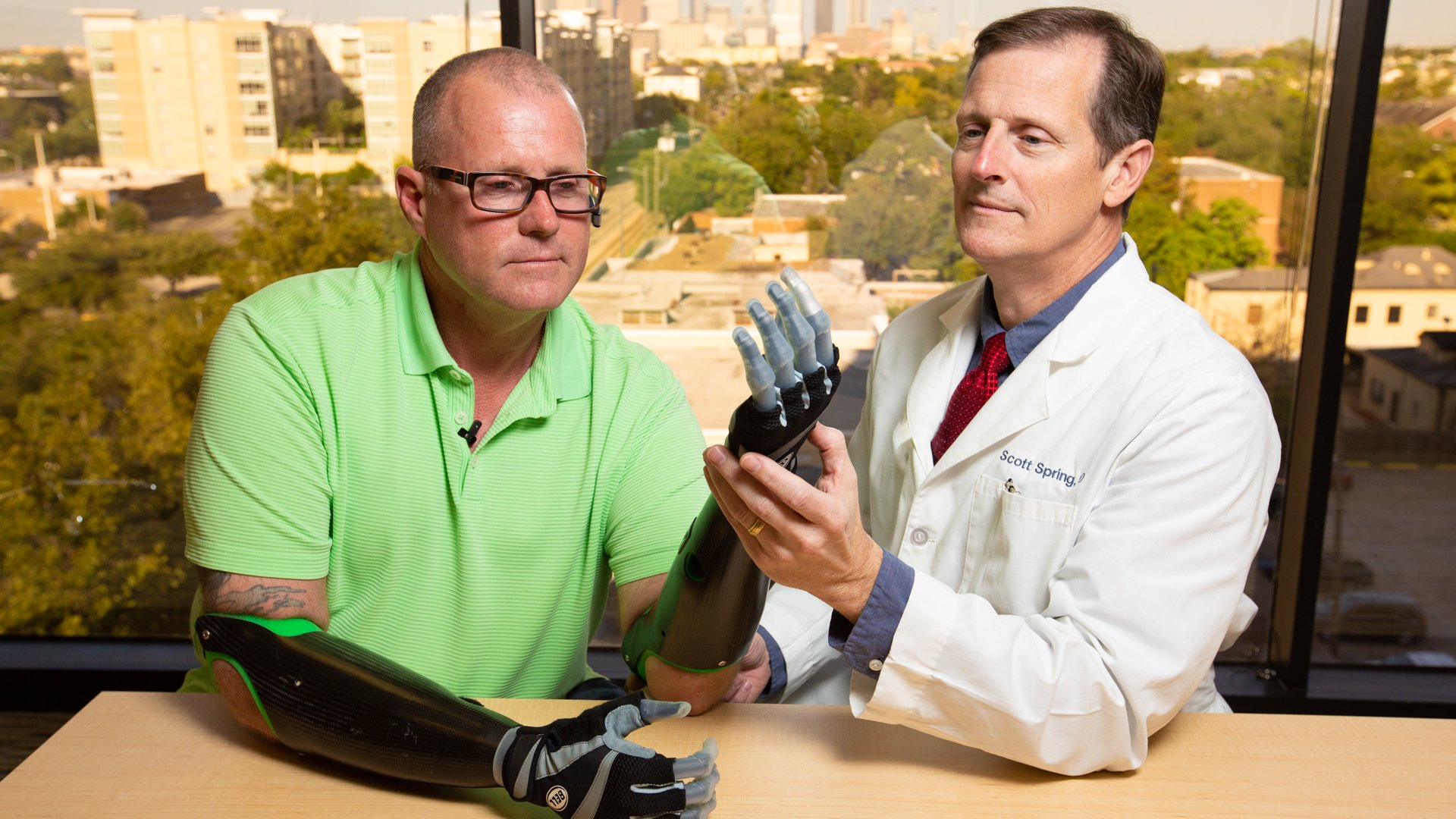 Arm Dynamics prosthetist with a bilateral amputee patient