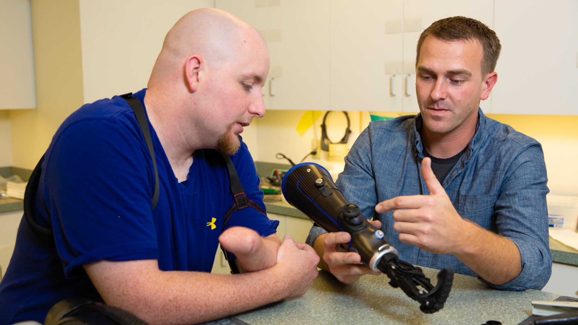 Lab technician working with patient