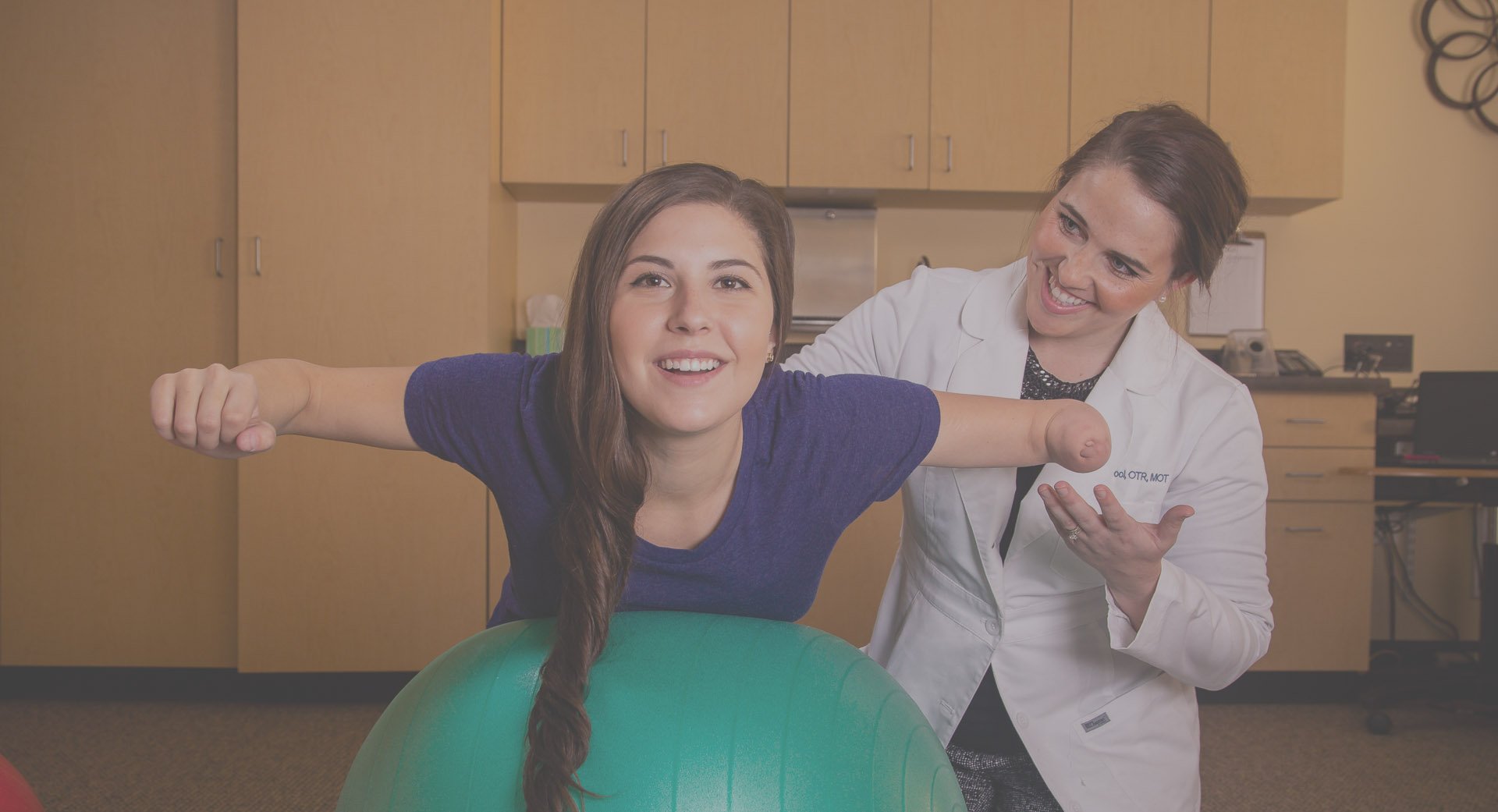 Angel Giuffria works with an Arm Dynamics Therapist