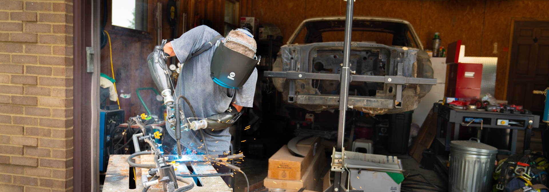 Gerry Kinney welding with body-powered prostheses