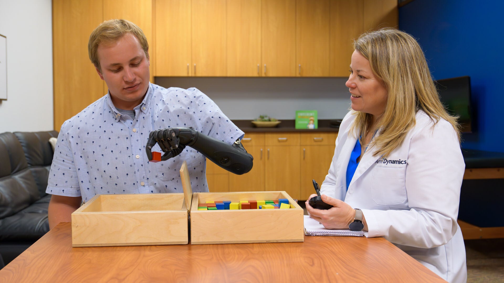 Transhumeral Amputee Doing Box and Blocks Outcome Measures with Upper Limb Clinical Therapy Specialist Becky Park, OTR/L
