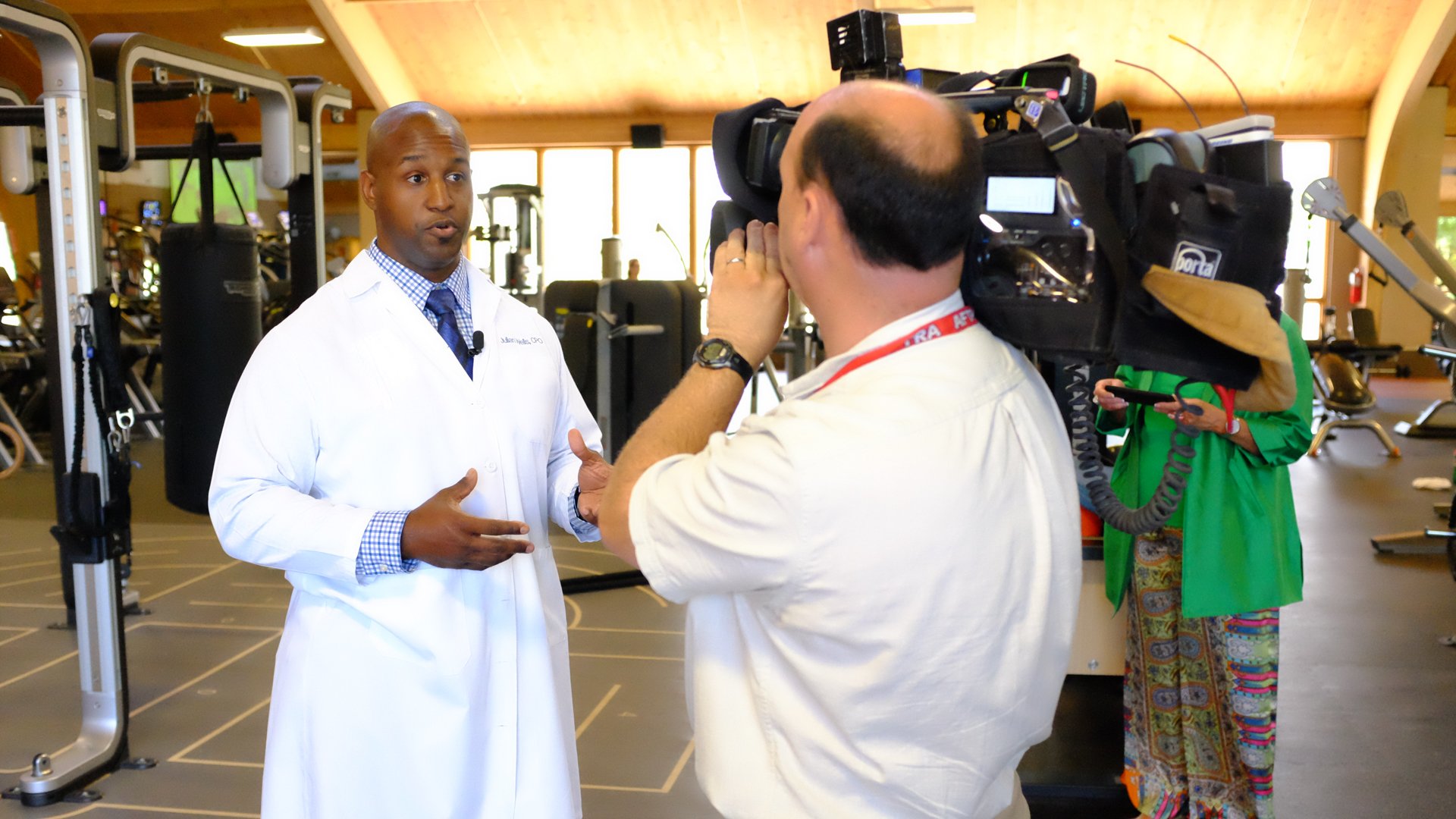 Julian Wells being interviewed by a news crew working on a story about patient Max Okun