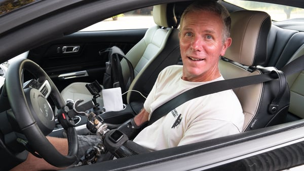 Gerry Kinney, a bilateral patient from the Kansas City Clinic, drives his car as a bilateral transradial amputee
