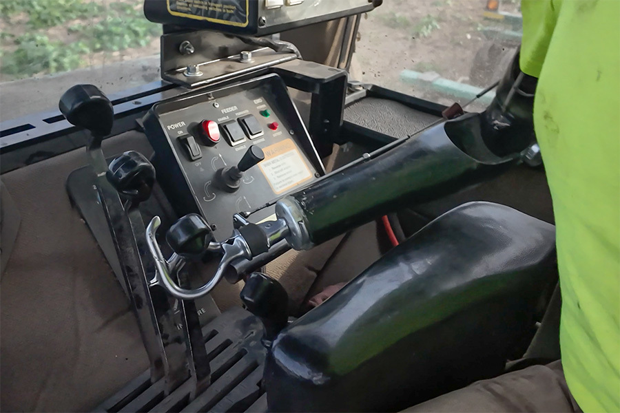 John Mitchell operating tractor