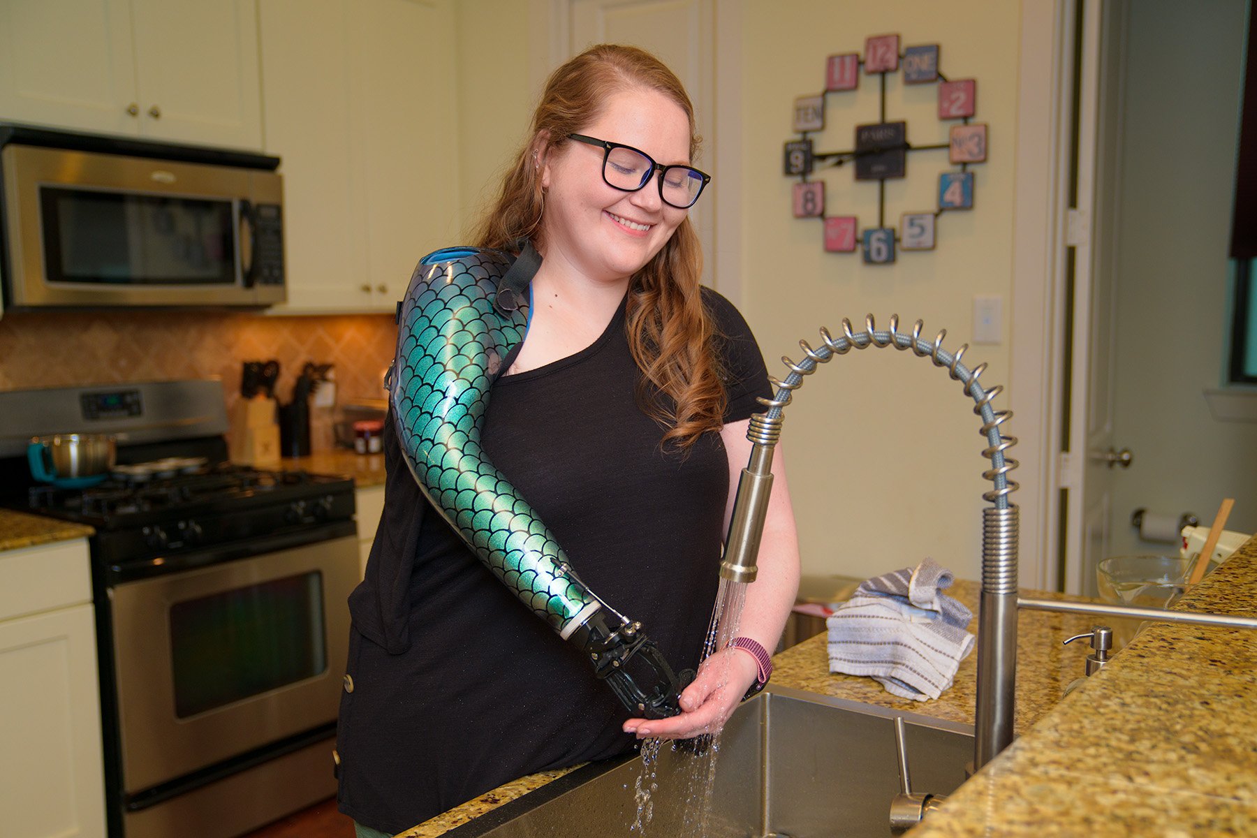 Marissa at Sink Washing Prosthesis