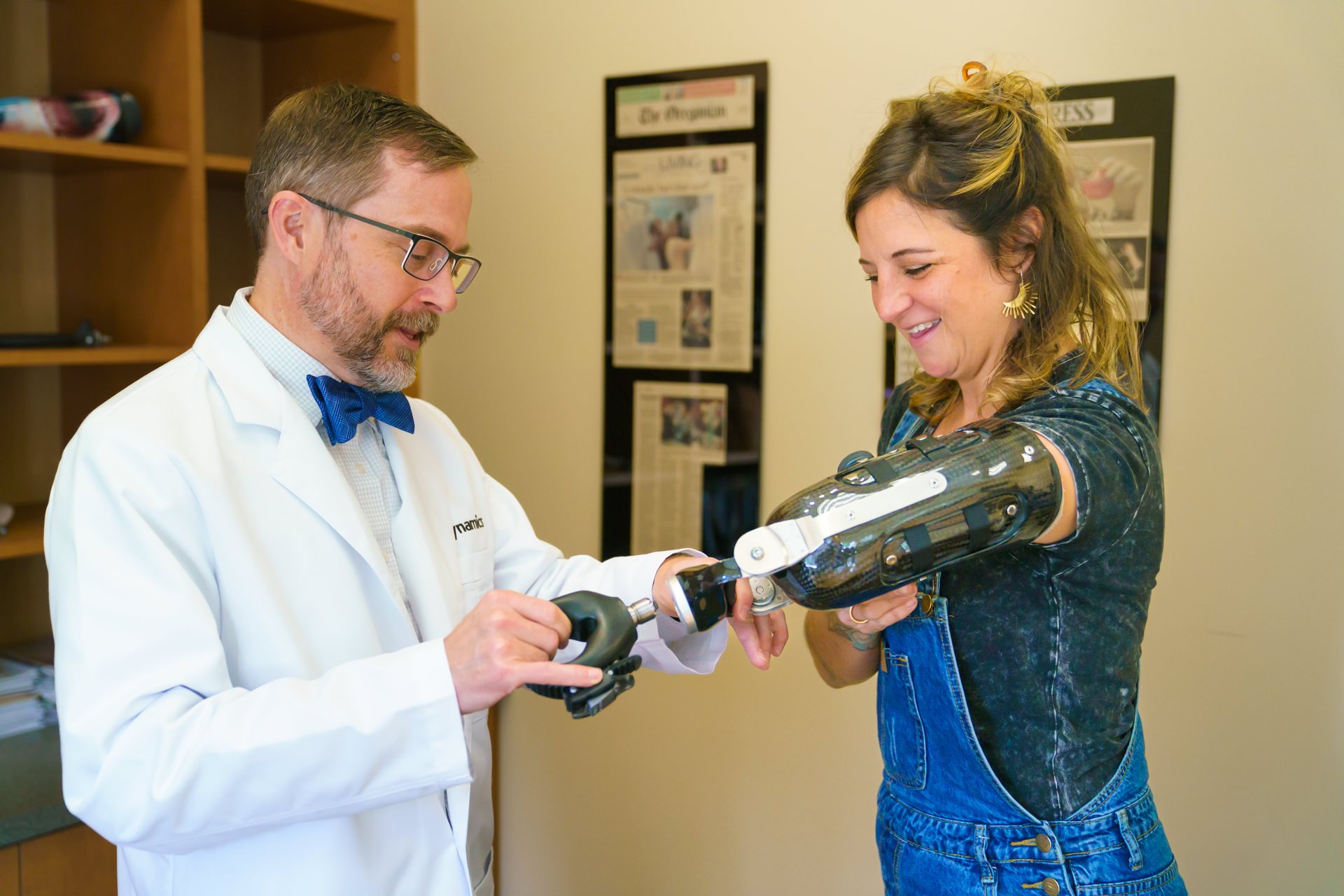 Portland prosthetist Mac Lang, works with patient Wendi Parker on her actiivity-specific attachments