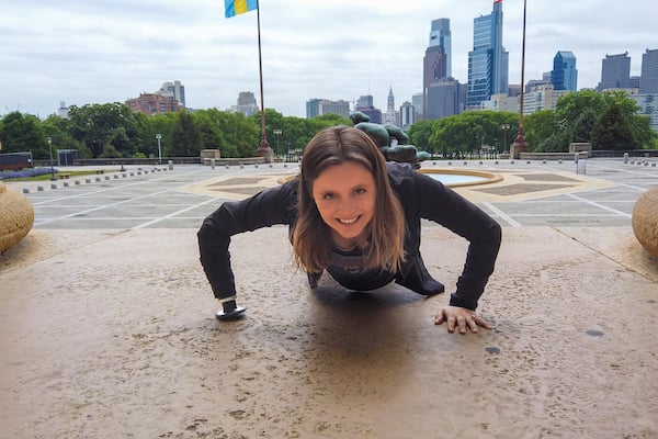 Arm Dynamics patient Taylor using her activity-specific prosthesis to do push ups.