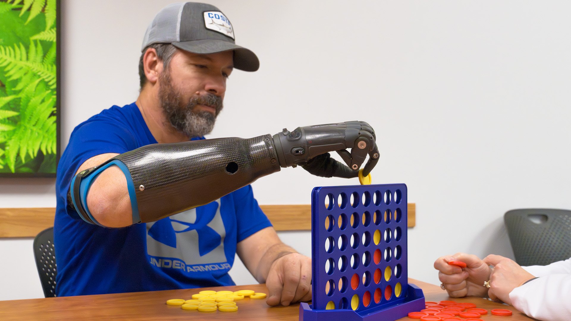 Todd playing game with Therapist