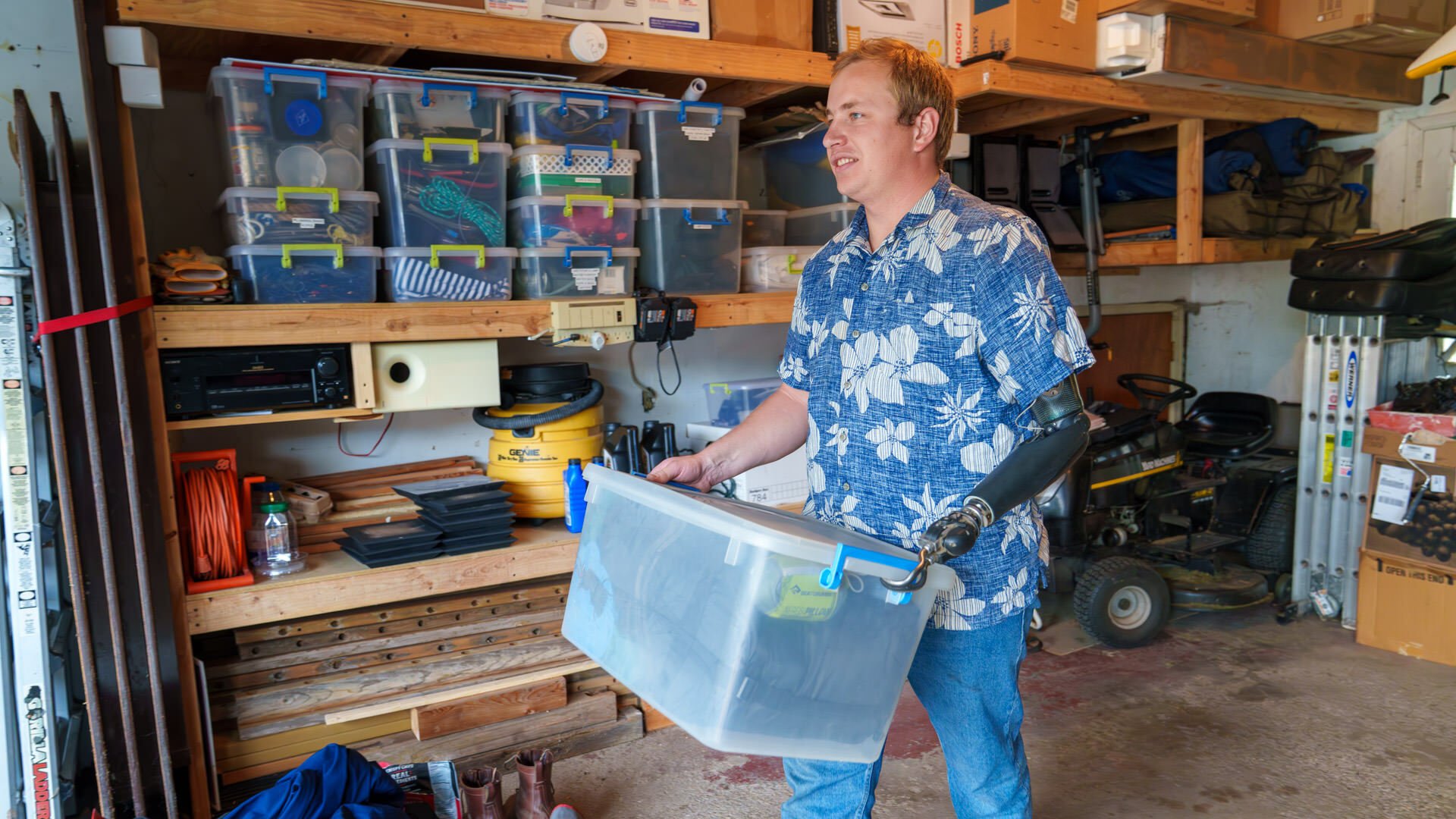 Transhumeral Amputee Organizing Garage Lifting Heavy Containers