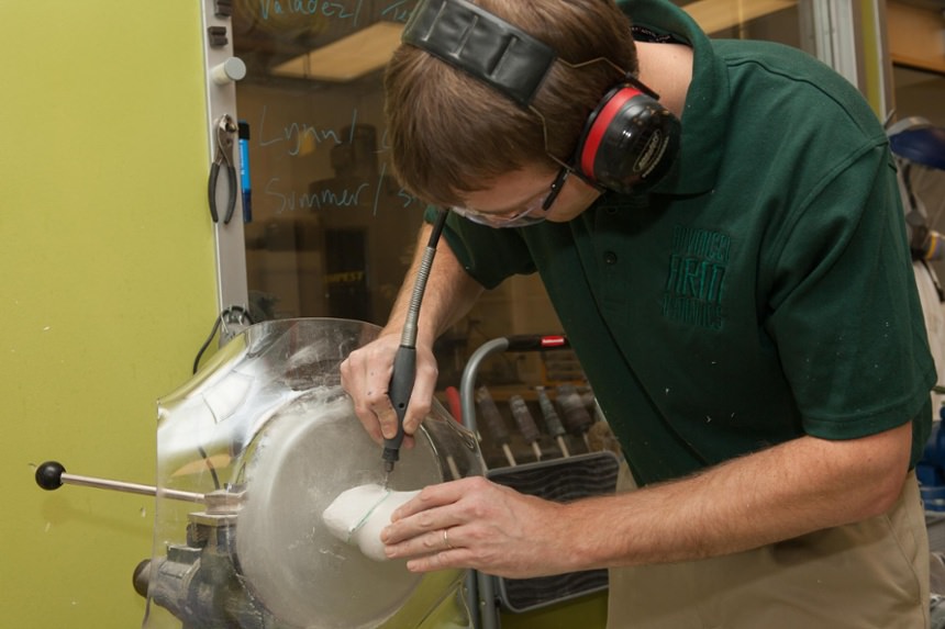 Technician Cullen Hayes creates the socket frame