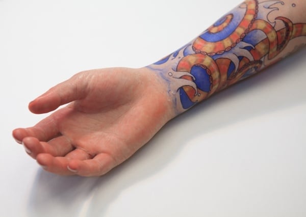 Custom silicone restoration prosthesis with tattoo decoration