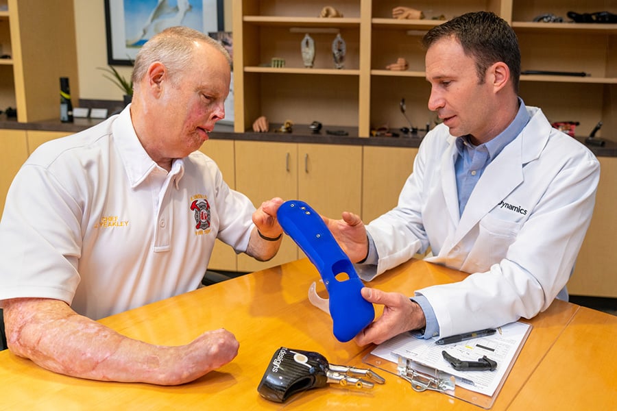Prosthetist discussing options with patient